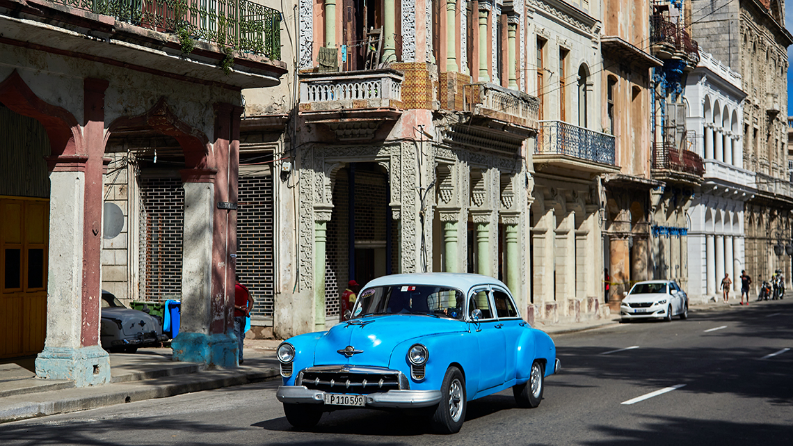 Vintage American car from 50s cruising the streets of Old Havana, Joanna Lumley's documentary film