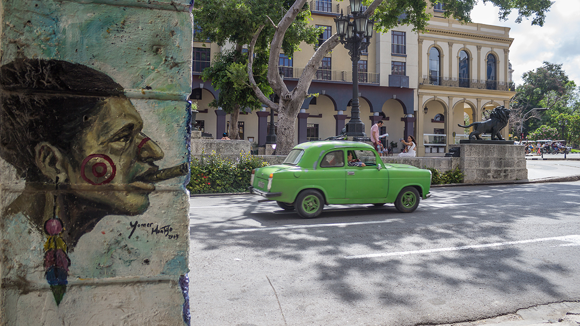 Graffiti by Taller Comunitario Jose Marti in the famous Prado y Neptuno corner of Old Havana